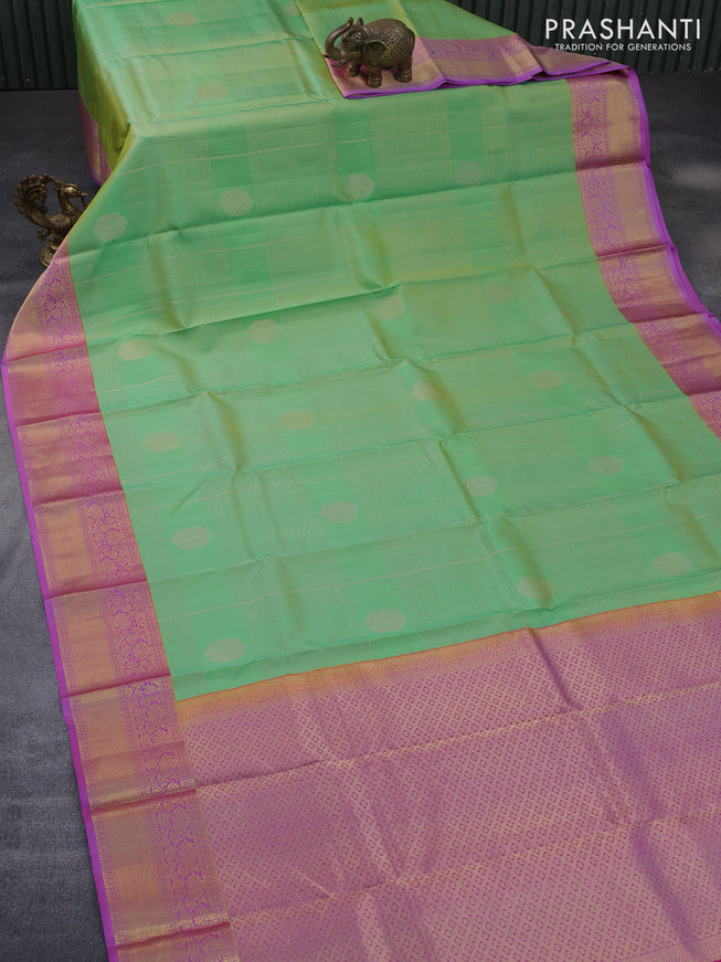 Pure kanchipuram silk saree green shade and purple with allover zari weaves & buttas and zari woven border