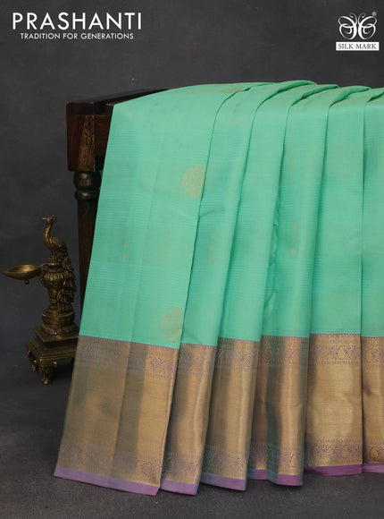 Pure kanchipuram silk saree teal green shade and pink shade with allover zari weaves and zari woven border