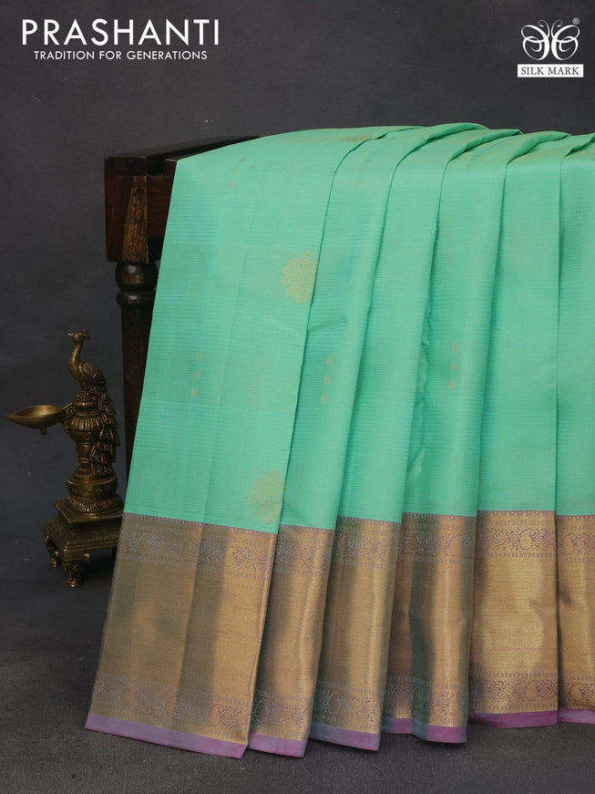 Pure kanchipuram silk saree teal green shade and pink shade with allover zari weaves and zari woven border