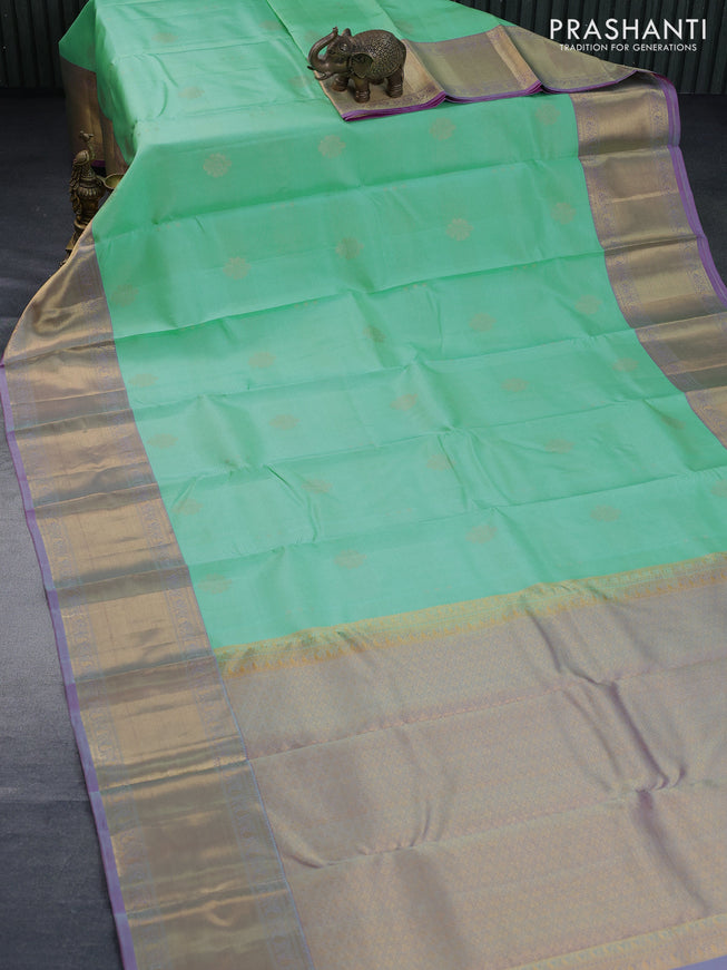 Pure kanchipuram silk saree teal green shade and pink shade with allover zari weaves and zari woven border