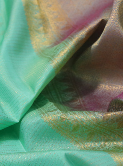 Pure kanchipuram silk saree teal green shade and pink shade with allover zari weaves and zari woven border