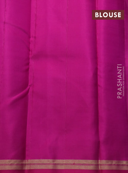 Pure kanchipuram silk saree dual shade of teal green and pink with allover self emboss and zari woven border