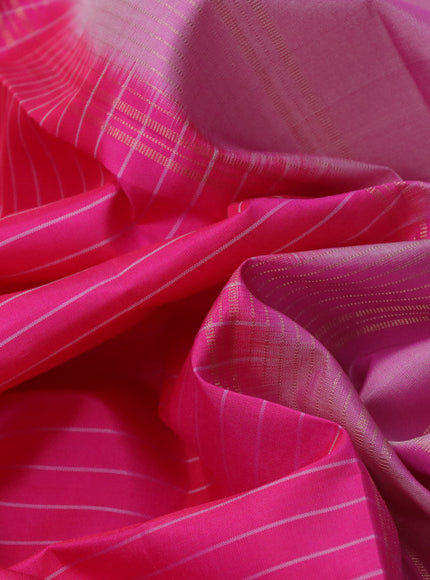 Pure kanchipuram silk saree pink and deep purple with allover stripes pattern and rettapet zari woven border