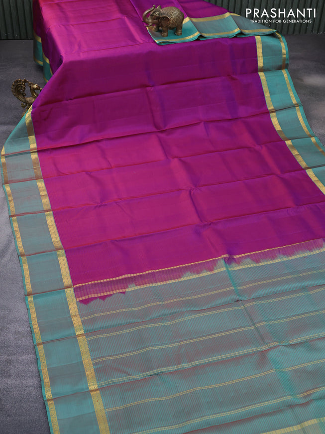 Pure kanchipuram silk saree purple and teal green with allover stripes pattern and rettapet zari woven border