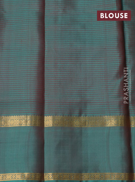 Pure kanchipuram silk saree purple and teal green with allover stripes pattern and rettapet zari woven border