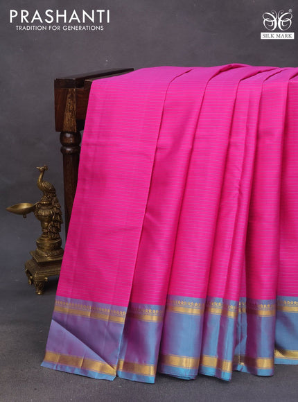 Pure kanchipuram silk saree pink and dual shade of teal blue with allover stripes pattern and rettapet zari woven border