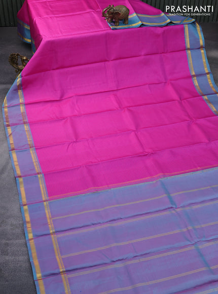 Pure kanchipuram silk saree pink and dual shade of teal blue with allover stripes pattern and rettapet zari woven border