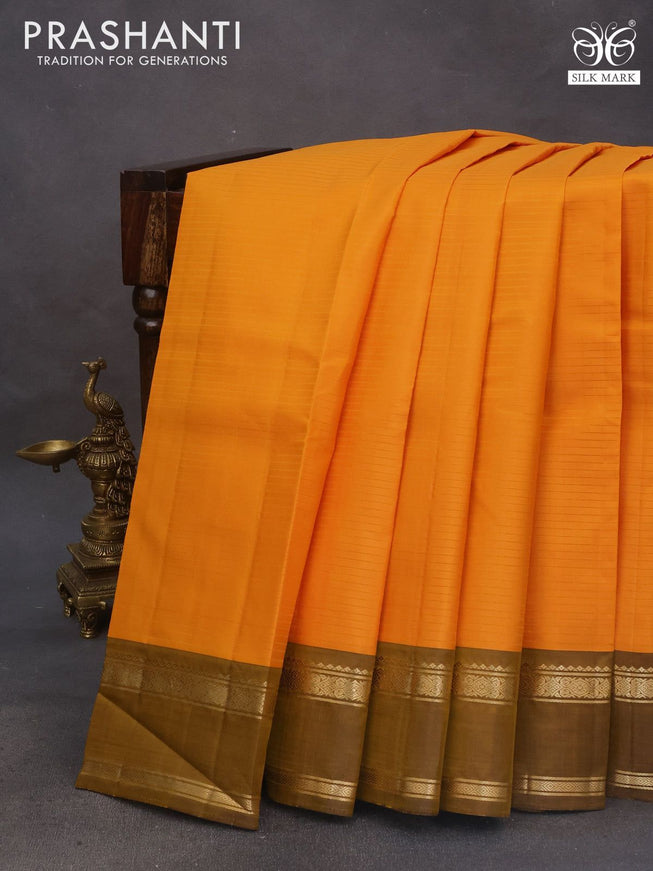 Pure kanchipuram silk saree orange and mehendi green with allover stripes pattern and rettapet zari woven border