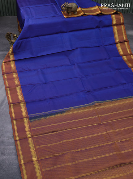 Pure kanchipuram silk saree blue and dark mustard with allover stripes pattern and rettapet zari woven border