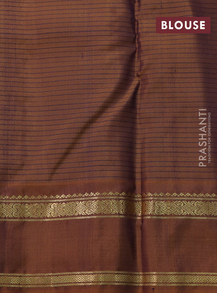 Pure kanchipuram silk saree blue and dark mustard with allover stripes pattern and rettapet zari woven border