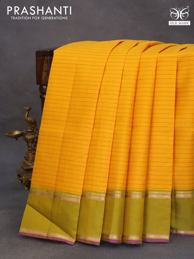 Pure kanchipuram silk saree mango yellow and violet with allover stripes pattern and rettapet zari woven border