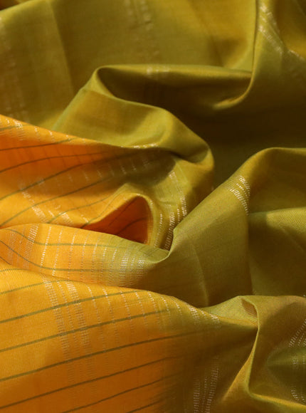 Pure kanchipuram silk saree mango yellow and violet with allover stripes pattern and rettapet zari woven border