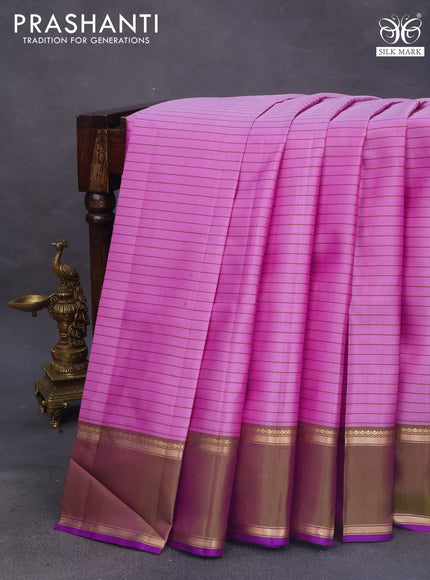 Pure kanchipuram silk saree light pink and violet with allover stripes pattern and rettapet zari woven border