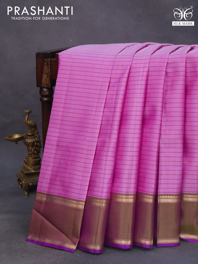 Pure kanchipuram silk saree light pink and violet with allover stripes pattern and rettapet zari woven border