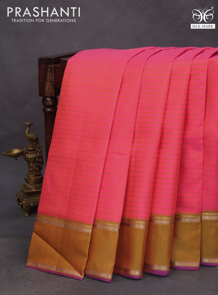 Pure kanchipuram silk saree dual shade of pinkish orange and violet with allover stripes pattern and rettapet zari woven border