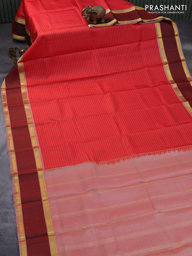 Pure kanchipuram silk saree red and maroon with allover stripes pattern and rettapet zari woven border