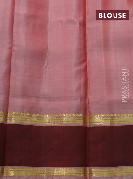 Pure kanchipuram silk saree red and maroon with allover stripes pattern and rettapet zari woven border