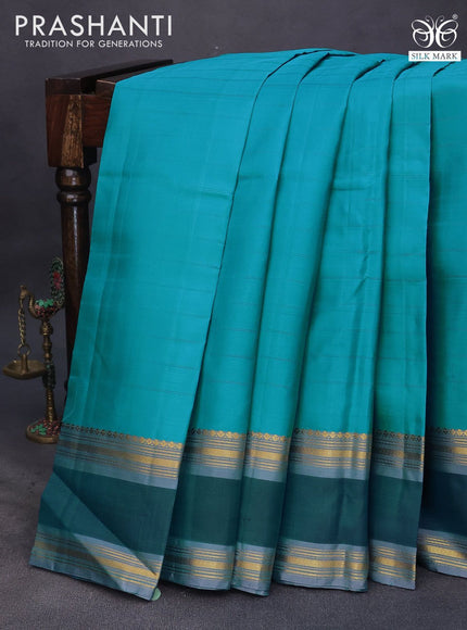 Pure kanchipuram silk saree teal blue and grey with allover stripes pattern and rettapet zari woven border