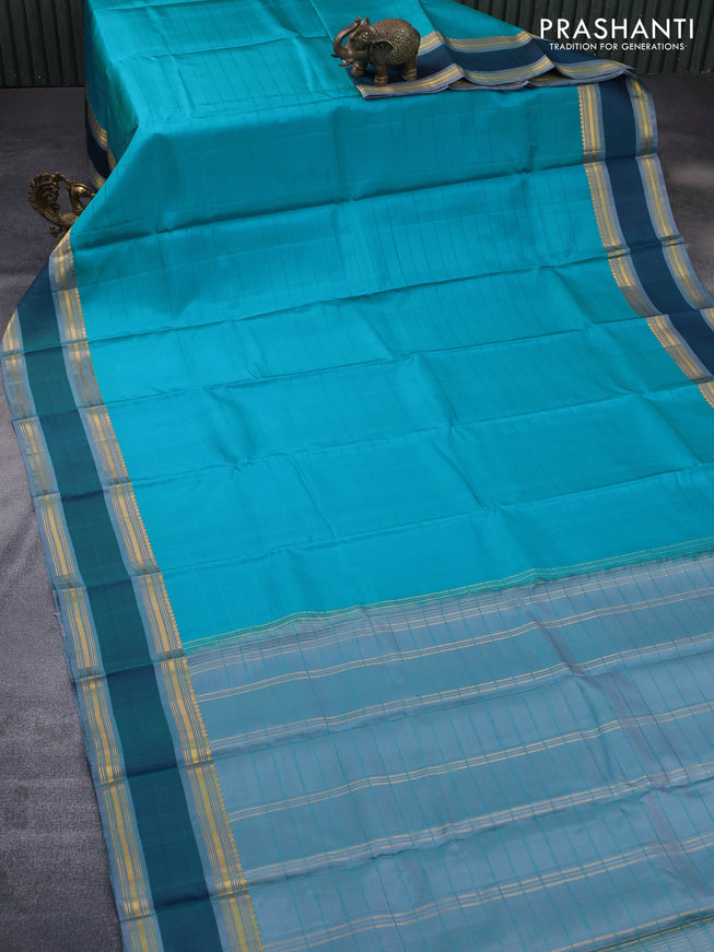 Pure kanchipuram silk saree teal blue and grey with allover stripes pattern and rettapet zari woven border