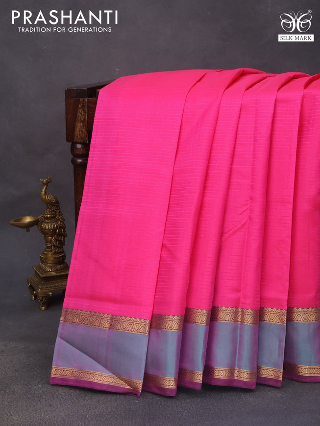 Pure kanchipuram silk saree pink and dark magenta pink with allover stripes pattern and rettapet zari woven border