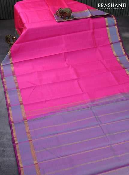 Pure kanchipuram silk saree pink and dark magenta pink with allover stripes pattern and rettapet zari woven border