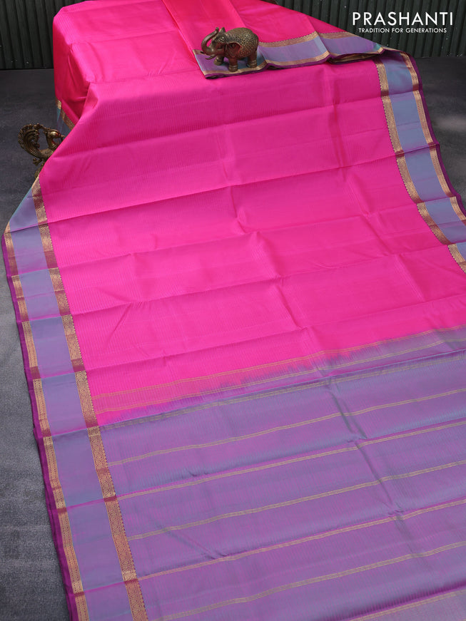 Pure kanchipuram silk saree pink and dark magenta pink with allover stripes pattern and rettapet zari woven border