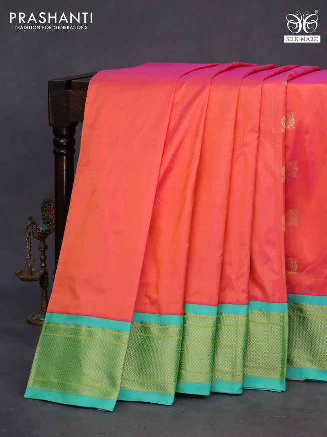 Pure paithani silk saree dual shade of pinkish yellow and teal blue with allover zari woven annam buttas and rich zari woven border