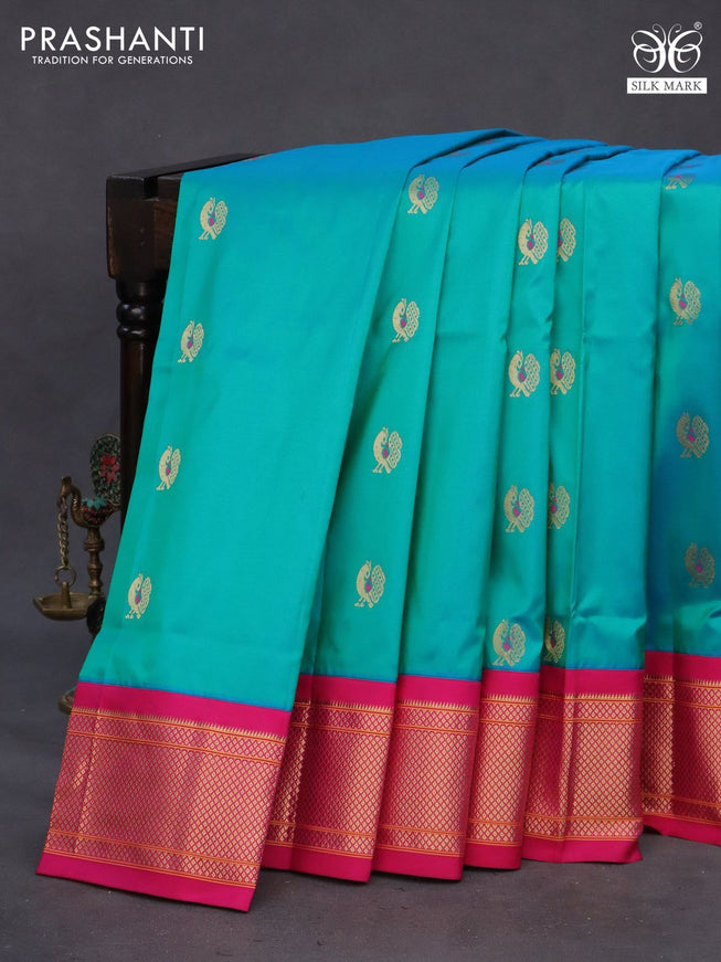 Pure paithani silk saree dual shade of teal bluish green and pink with allover annam zari woven buttas and rich zari woven border