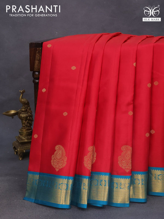 Pure kanchipuram silk saree reddish pink and peacock blue with zari woven buttas and rich zari woven korvai border