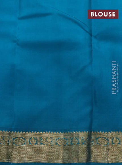 Pure kanchipuram silk saree reddish pink and peacock blue with zari woven buttas and rich zari woven korvai border