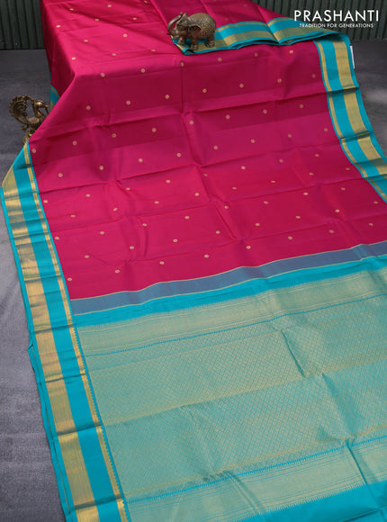 Pure kanchipuram silk saree dark pink and teal green shade with zari woven buttas and rettapet zari woven korvai border