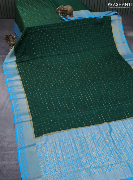 Pure mysore silk saree bottle green and blue with allover self emboss & zari buttas and rich zari woven border