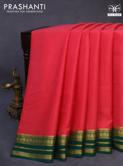 Pure mysore silk saree peach shade and green with plain body and rich zari woven border