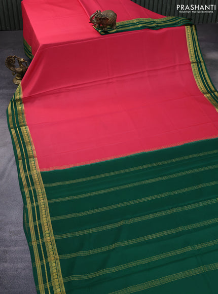 Pure mysore silk saree peach shade and green with plain body and rich zari woven border