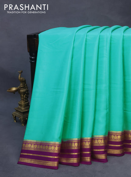 Pure mysore silk saree teal blue and purple with plain body and rich zari woven border