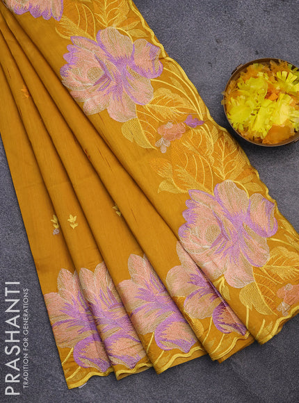 Semi raw silk saree mustard yellow with embroidery work buttas and floral design embroidery work border