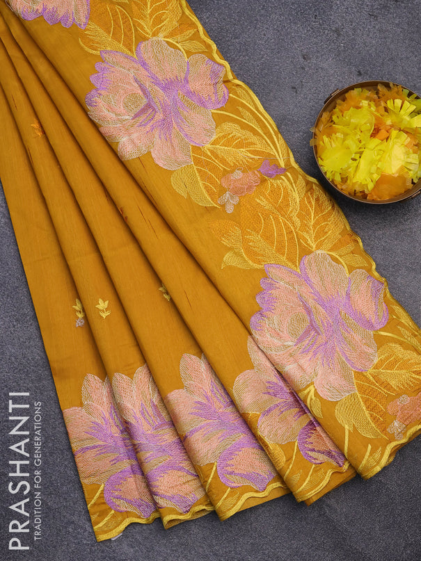 Semi raw silk saree mustard yellow with embroidery work buttas and floral design embroidery work border