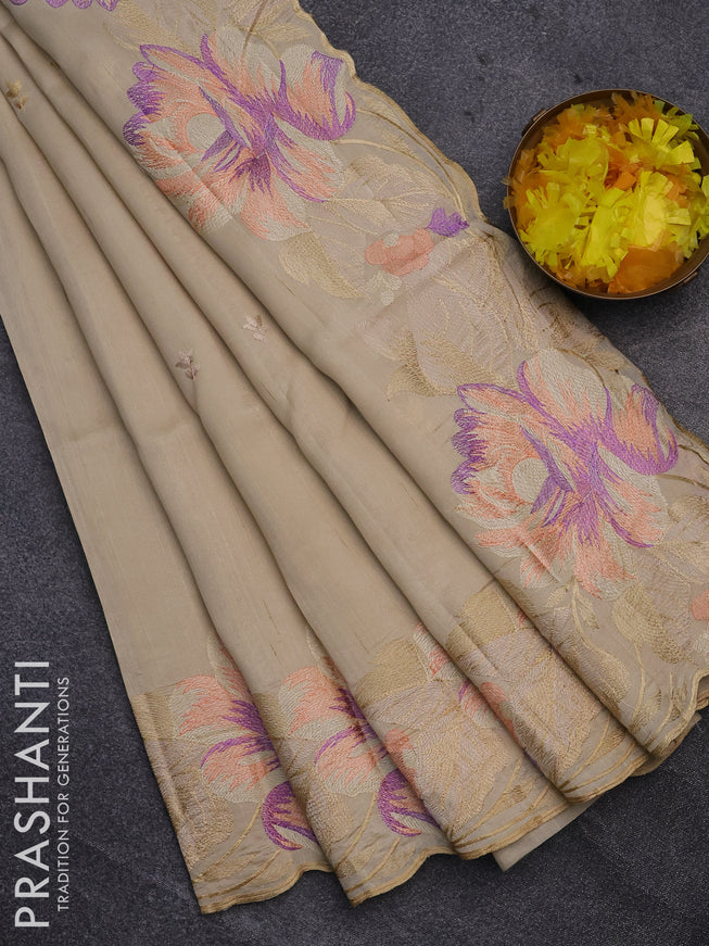 Semi raw silk saree beige with embroidery work buttas and floral design embroidery work border