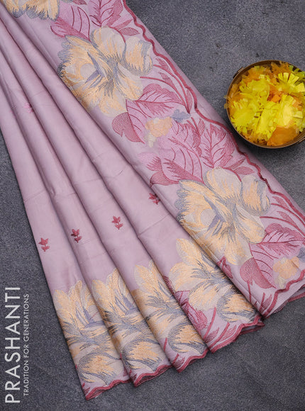 Semi raw silk saree pastel lavender with embroidery work buttas and floral design embroidery work border