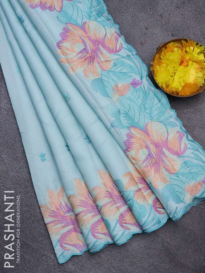 Semi raw silk saree teal blue shade with embroidery work buttas and floral design embroidery work border