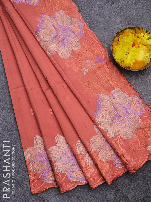 Semi raw silk saree rustic orange with embroidery work buttas and floral design embroidery work border