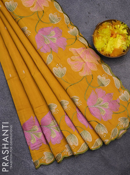 Semi raw silk saree mustard yellow with embroidery work buttas and floral design embroidery work border