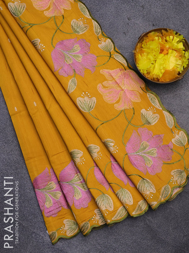 Semi raw silk saree mustard yellow with embroidery work buttas and floral design embroidery work border