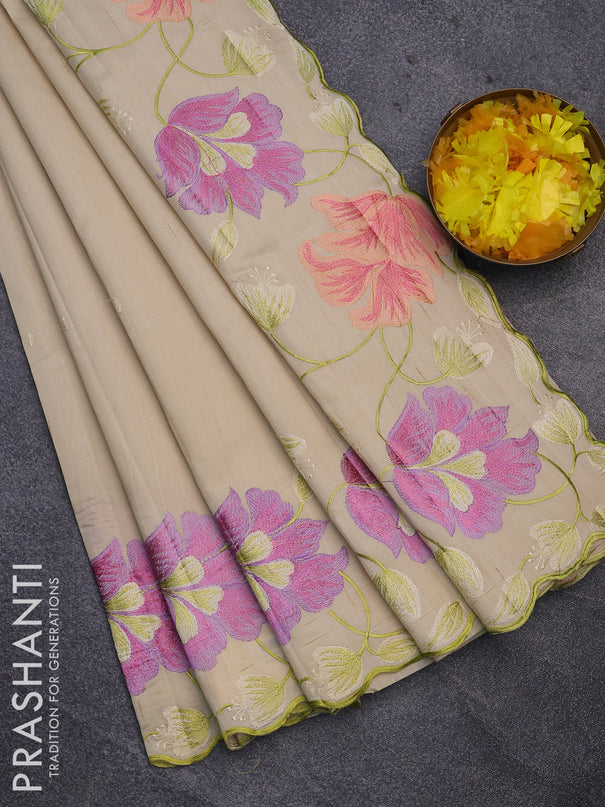 Semi raw silk saree cream with embroidery work buttas and floral design embroidery work border