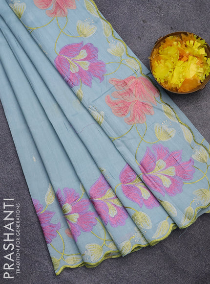 Semi raw silk saree teal blue shade with embroidery work buttas and floral design embroidery work border