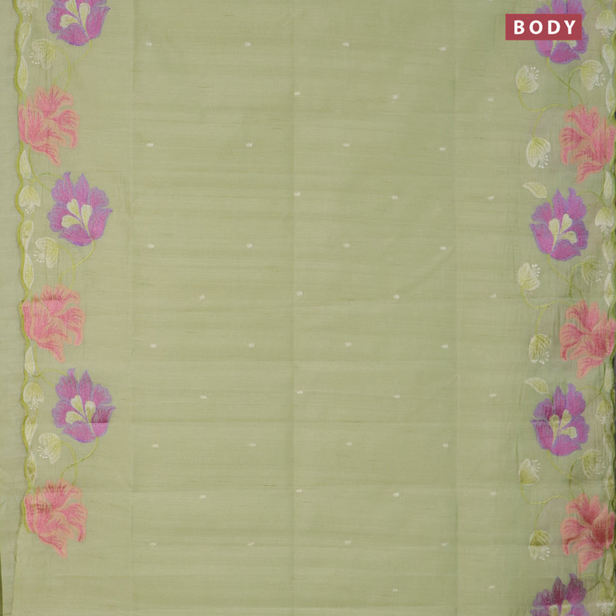 Semi raw silk saree mild pista green with embroidery work buttas and floral design embroidery work border