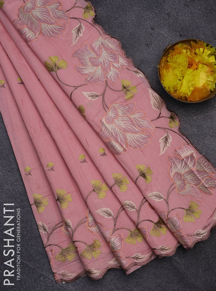 Semi raw silk saree peach shade with embroidery work buttas and floral design embroidery work border