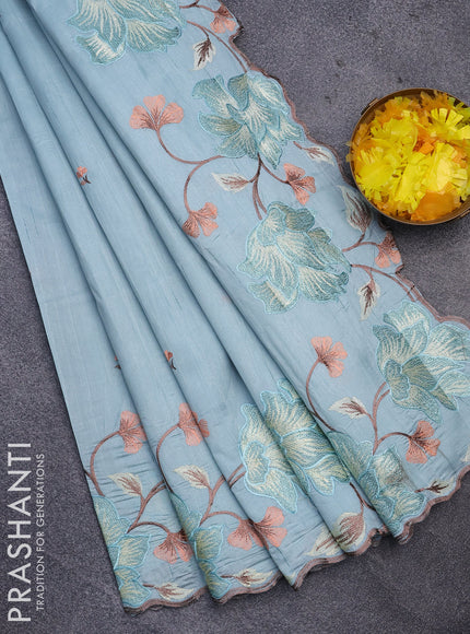 Semi raw silk saree pastel blue shade with embroidery work buttas and floral design embroidery work border