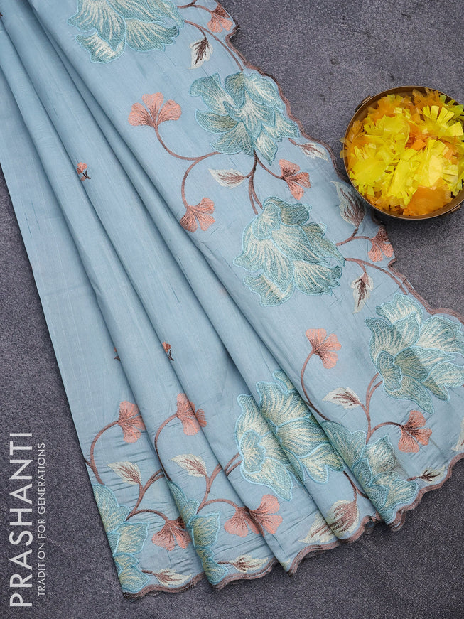 Semi raw silk saree pastel blue shade with embroidery work buttas and floral design embroidery work border