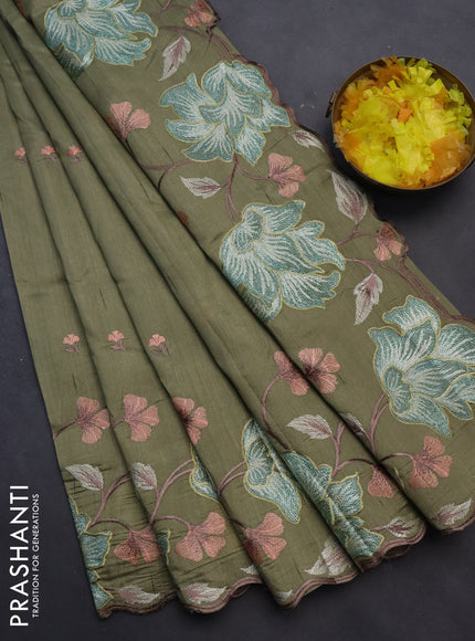 Semi raw silk saree elaichi green with embroidery work buttas and floral design embroidery work border